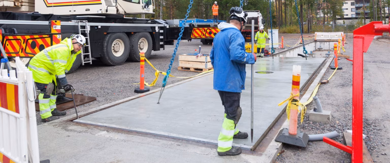 Workers installing a truck scale