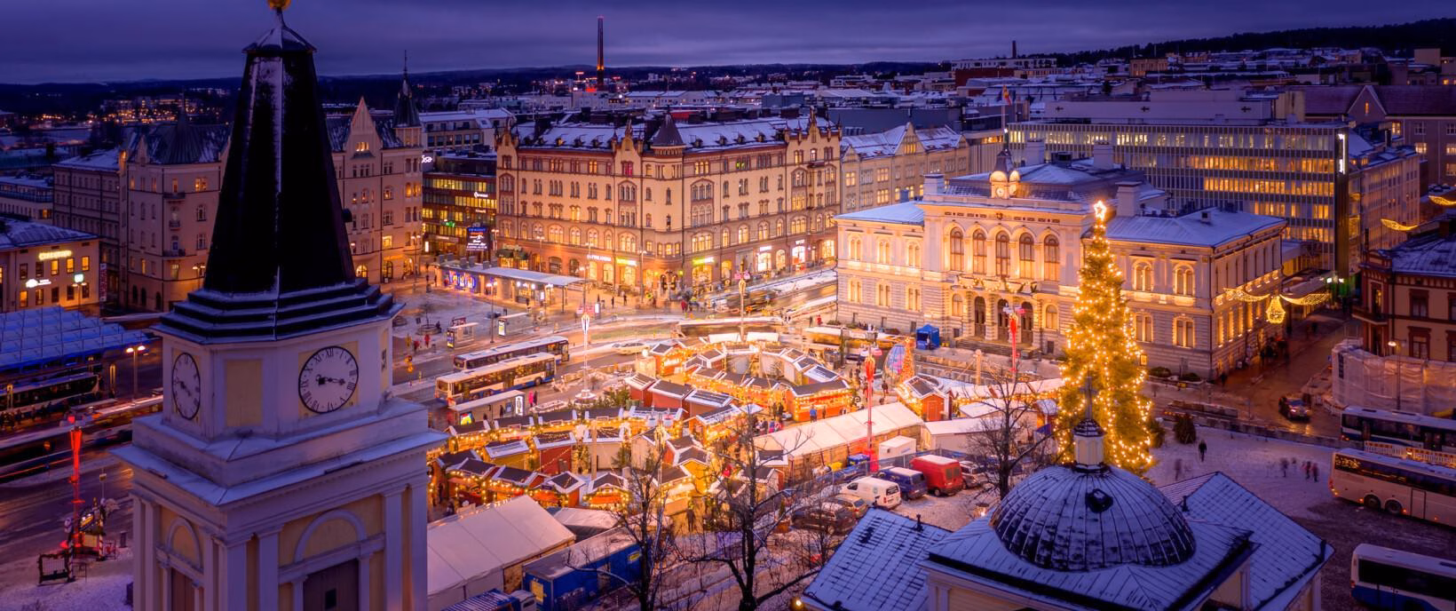 An aerial view of a Christmas market in a city center