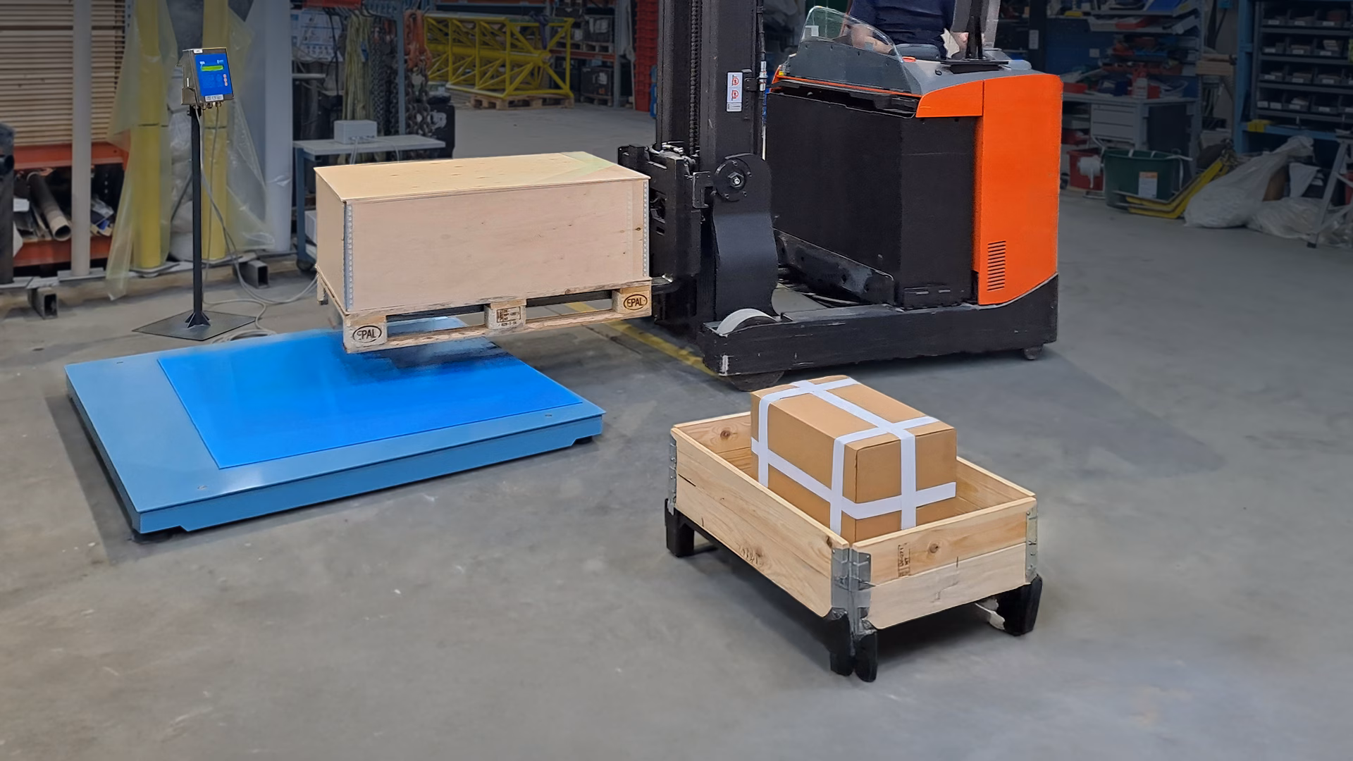 Forklift lifting a pallet onto an industrial floor scale for weighing