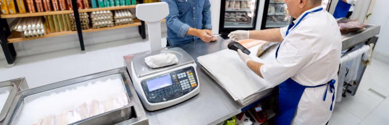 Retail scale at a fish counter during customer checkout